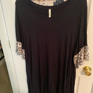 Knit dress. Black. With leopard flare sleeves.